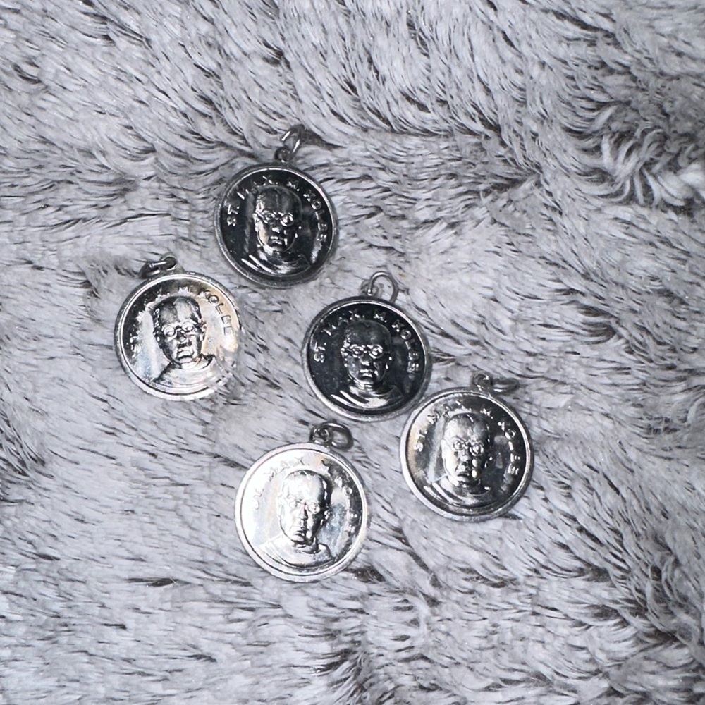 Vintage Saint Maximillian Kolbe pendants